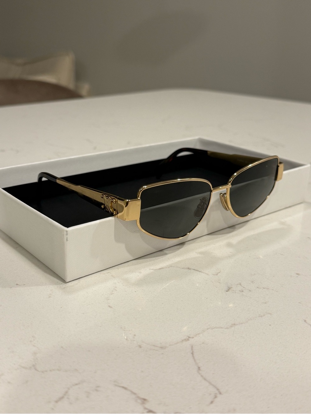 Elegant Gold Frame Sunglasses with Black Lenses for Women